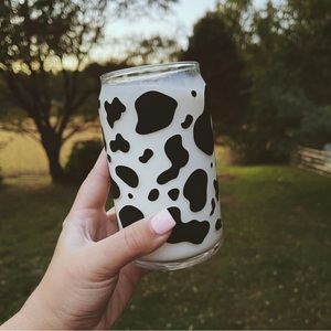 Cow print cup comes with bamboo lid and a straw.